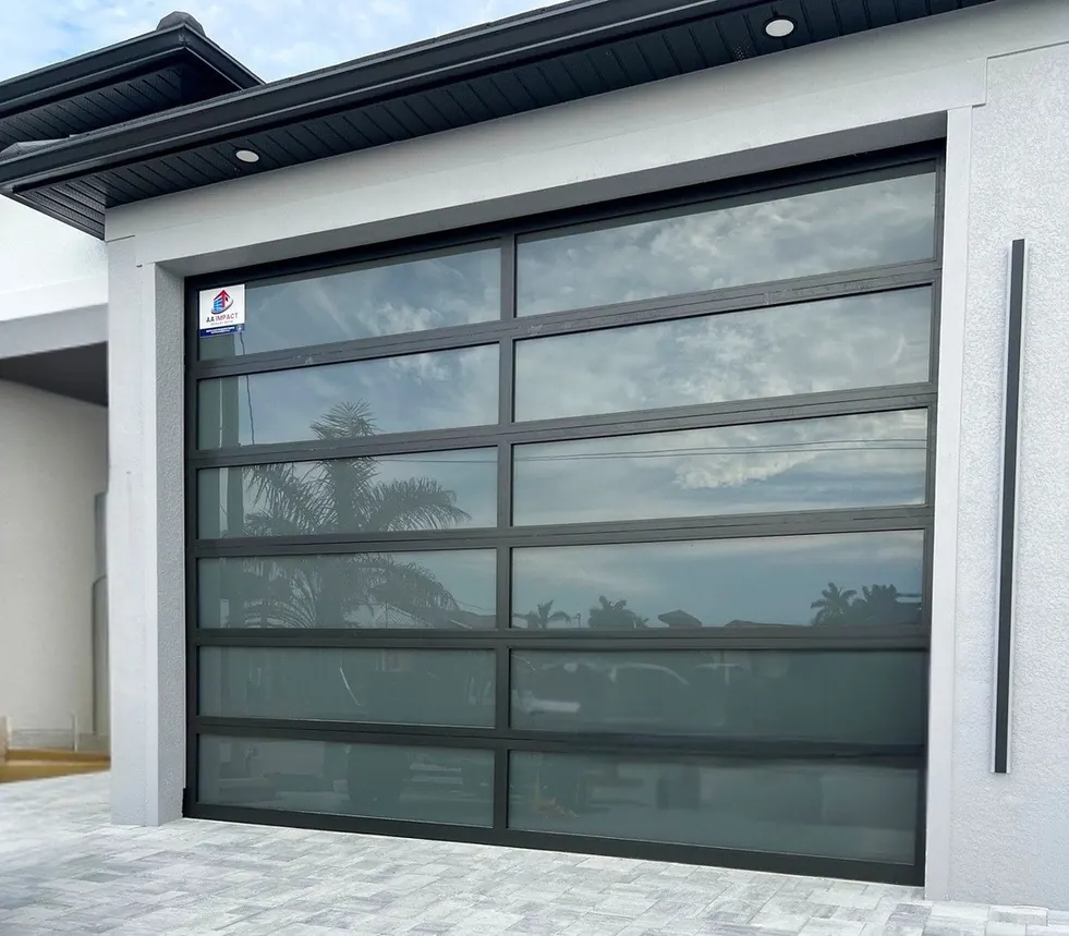 Close view of an AA Impact laminated glass door with a black aluminum frame