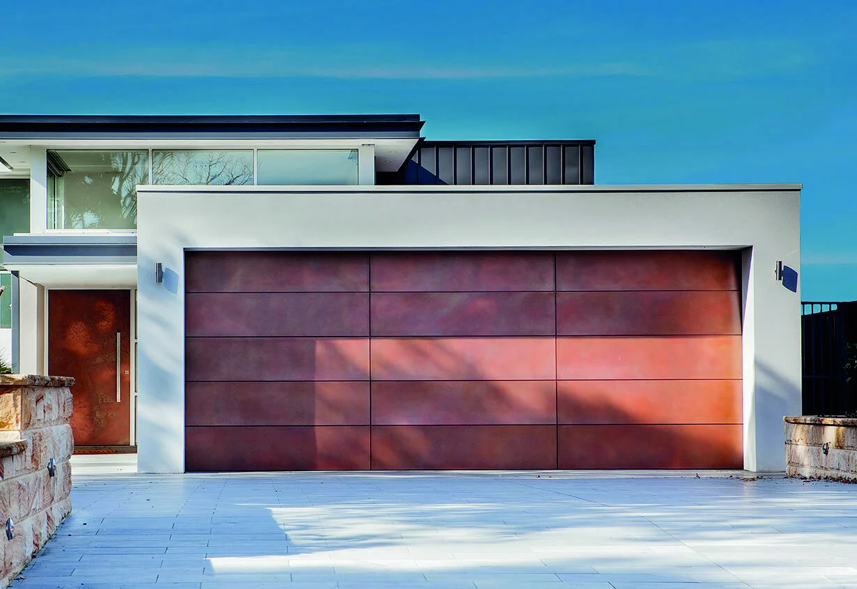 Amarr by Design AD4000 handcrafted wood door on a contemporary home