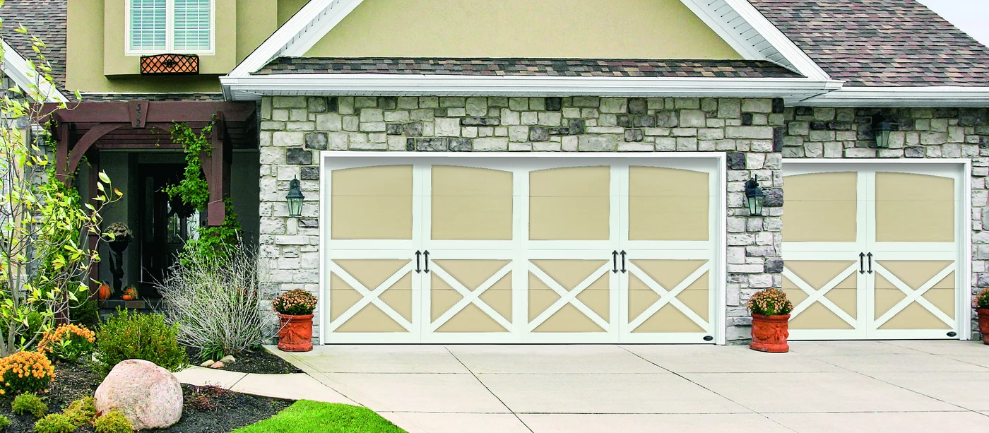 Amarr Carriage Court doors in cream with cross-buck overlays and square windows