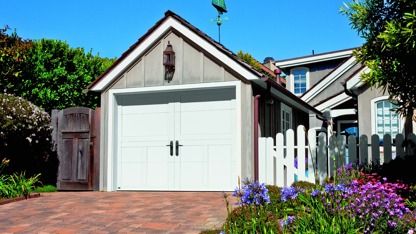 Amarr Fairfield design in True White with decorative handles