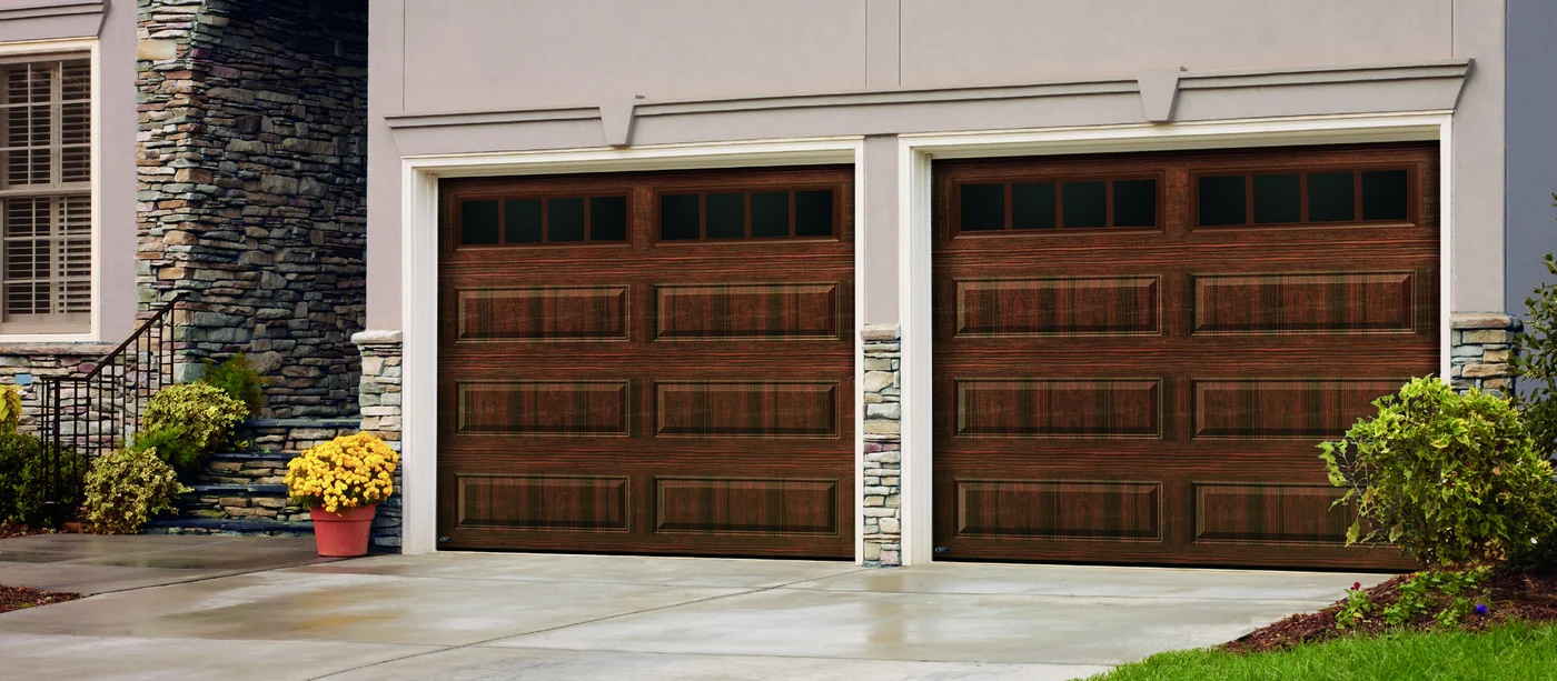 Amarr Heritage carriage house doors in a walnut wood-look finish