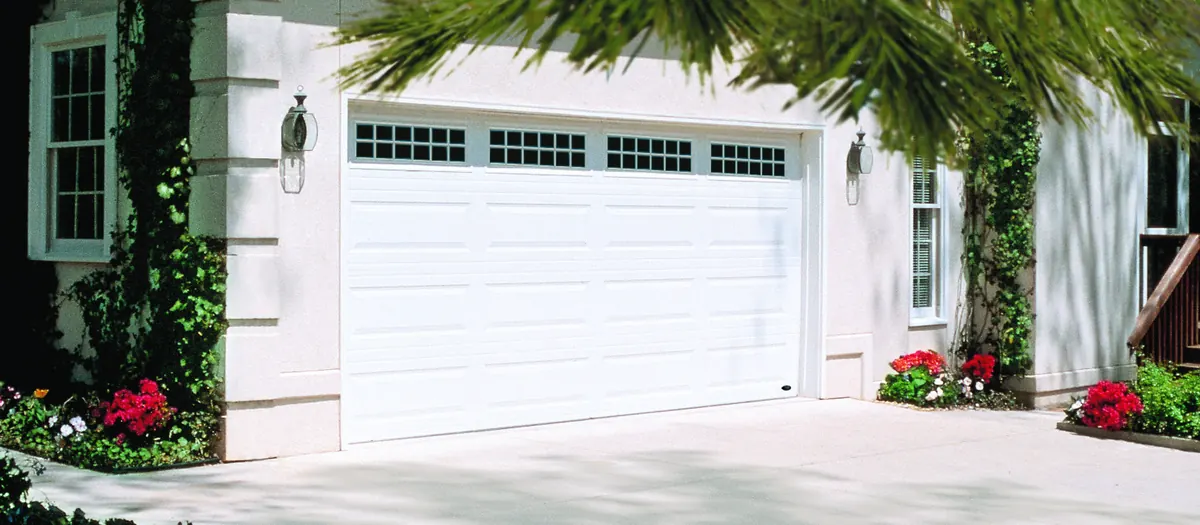 Grey Amarr Lincoln door on a modern stucco home