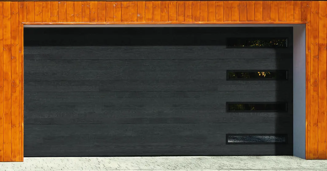 Black Amarr Northwoods flush door with slot windows in a wood framed garage