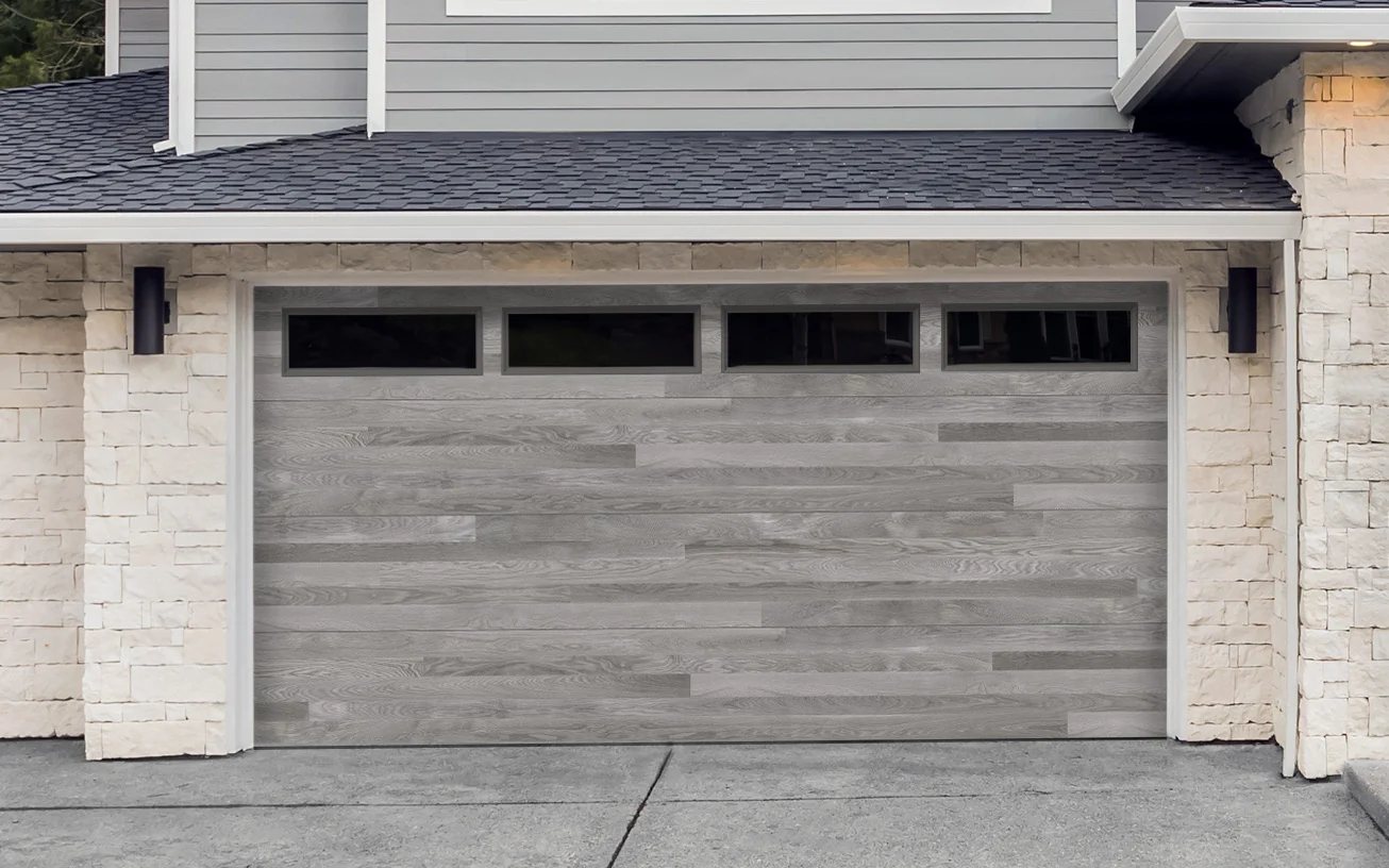 Amarr Northwoods doors with a printed horizontal plank finish in grey