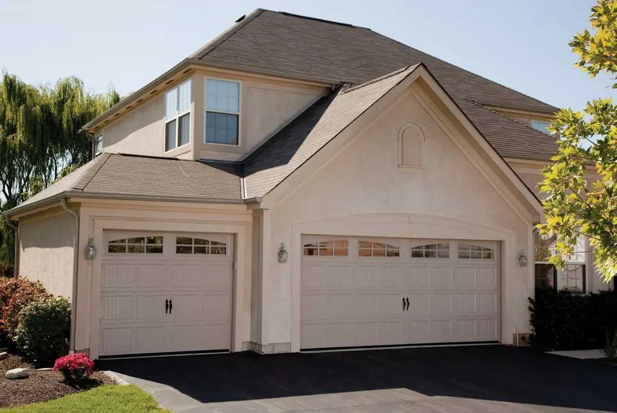 Haas 2500 series garage door, 2560 in Sandstone with 6-Pane Carriage House Double Arch Windows
