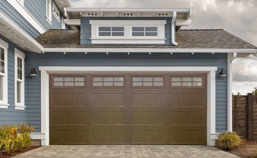 Haas Door specialty glass in the top windows of a wood look raised panel door