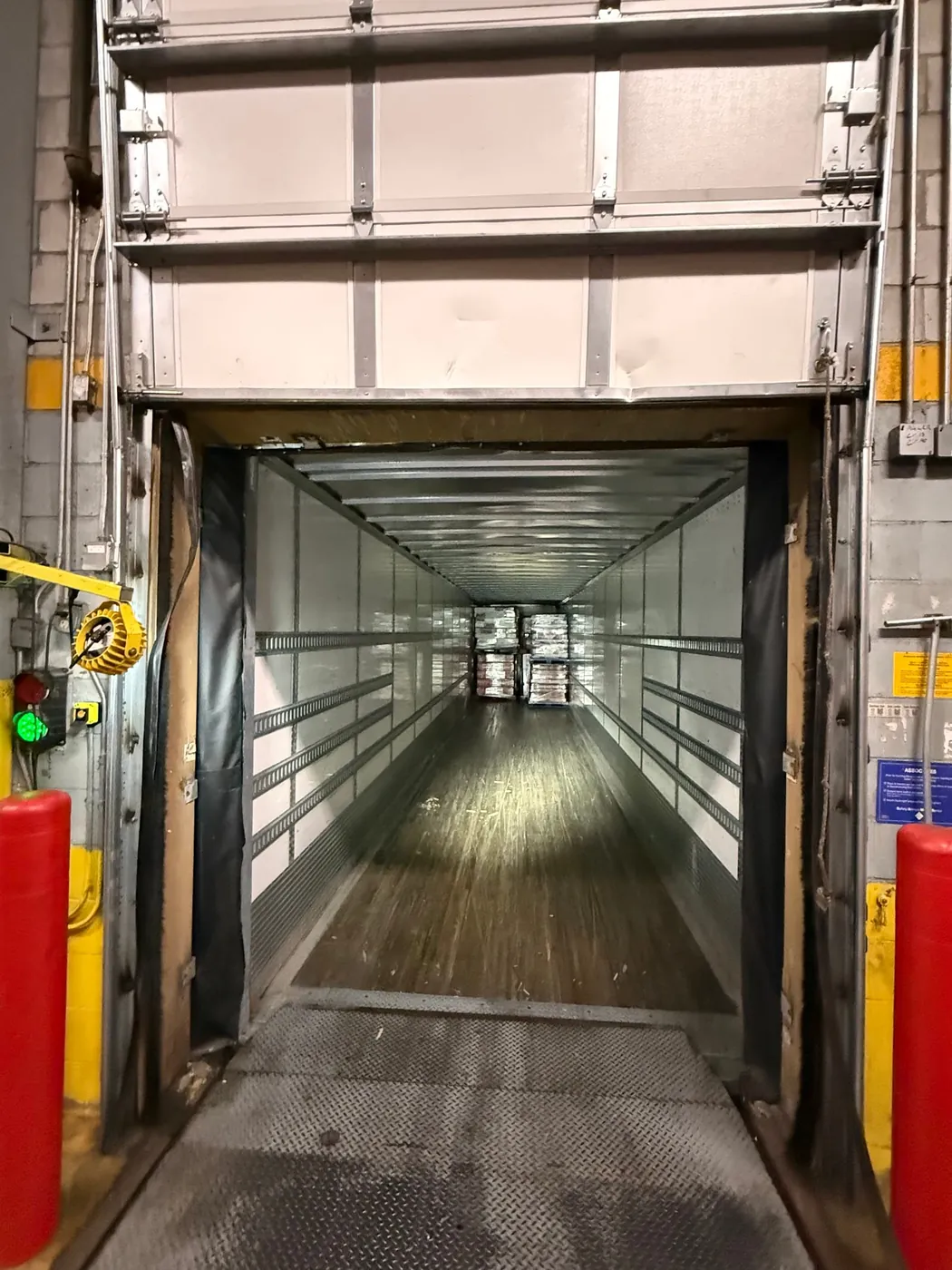 Loading dock corridor with commercial doors maintained by CMC Door Service