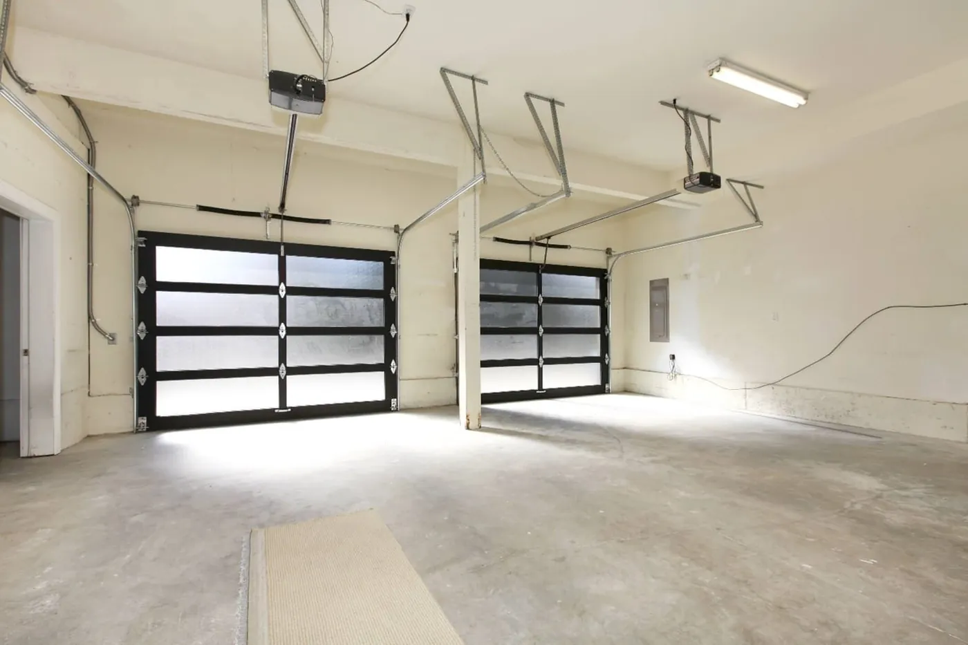 Residential garage interior with a newly fitted opener