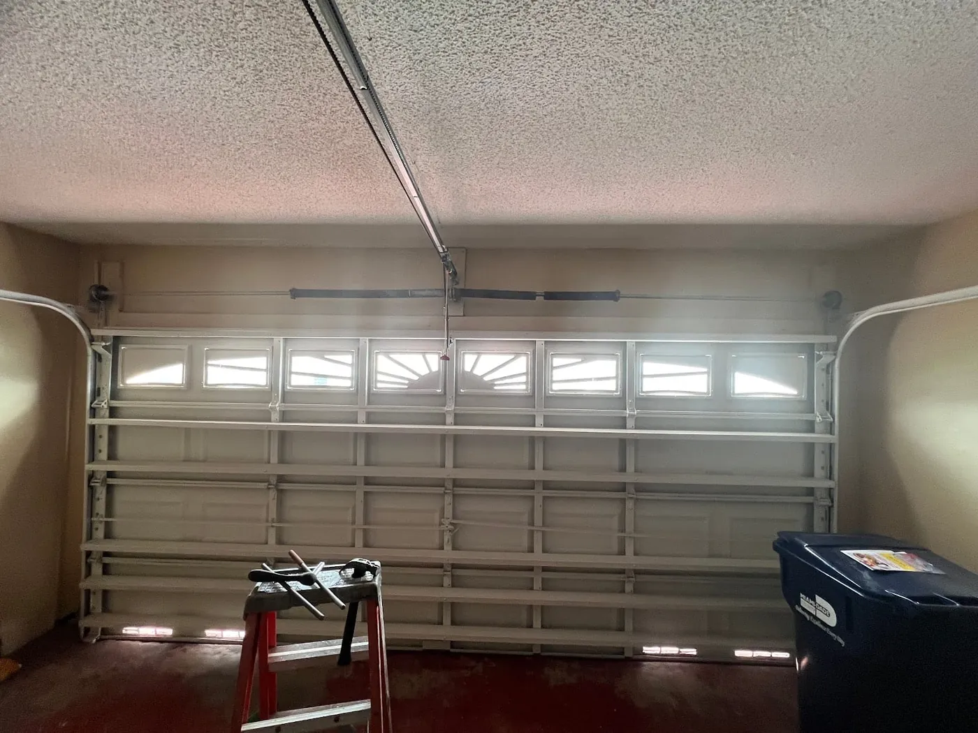 Interior of a residential garage after a CMC door and opener service