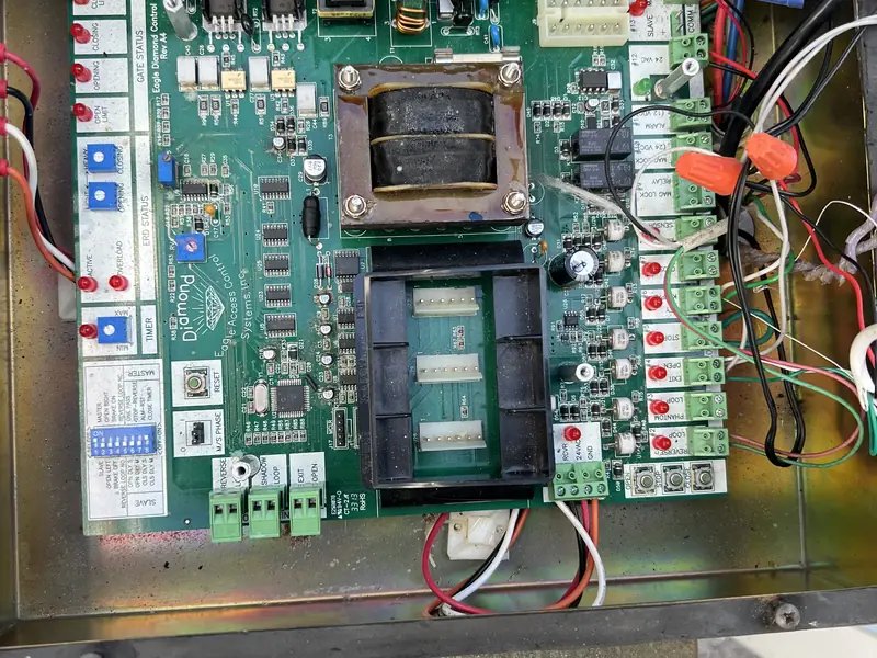 Gate operator control board during service