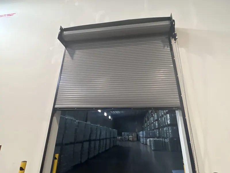 Grey rolling steel door open on a warehouse bay