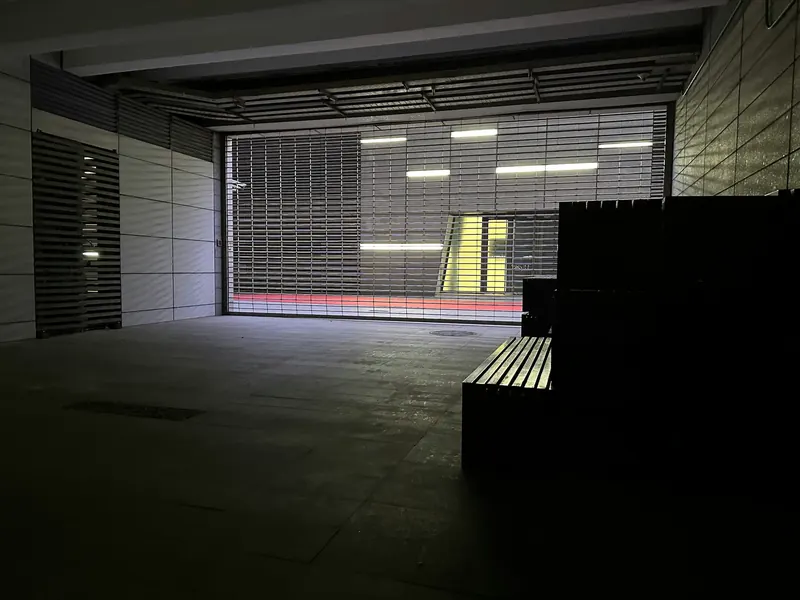 Rolling steel door seen from inside a parking garage