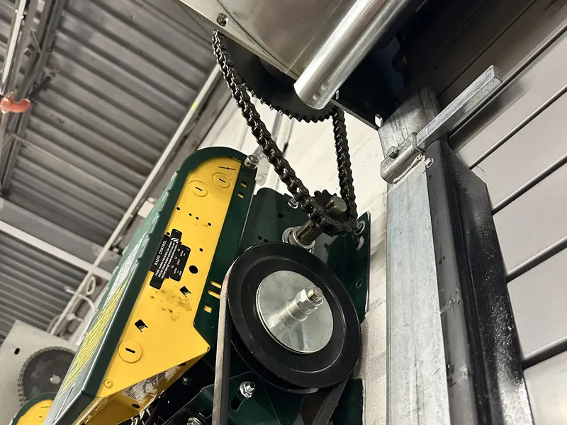 Rolling door operator motor and chain drive