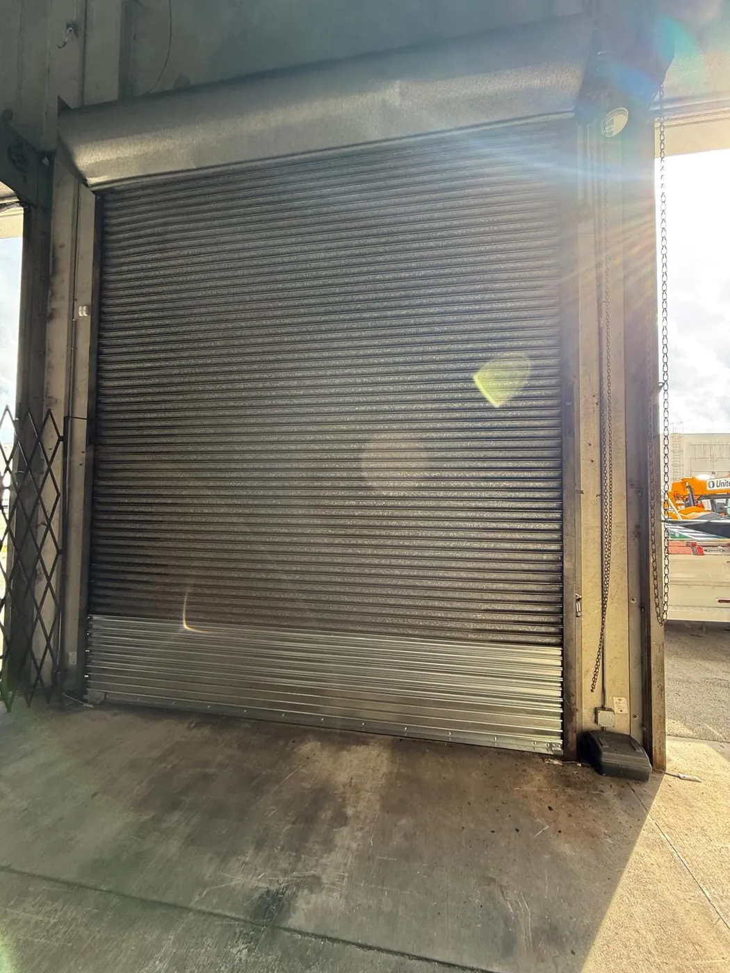 Interior of a commercial rolling steel door serviced by CMC Door Service