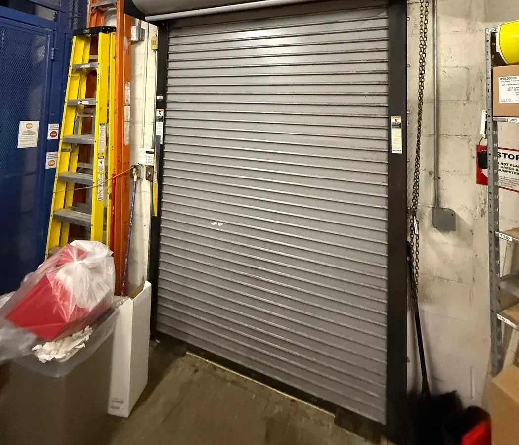 Commercial rolling steel door and motorised operator