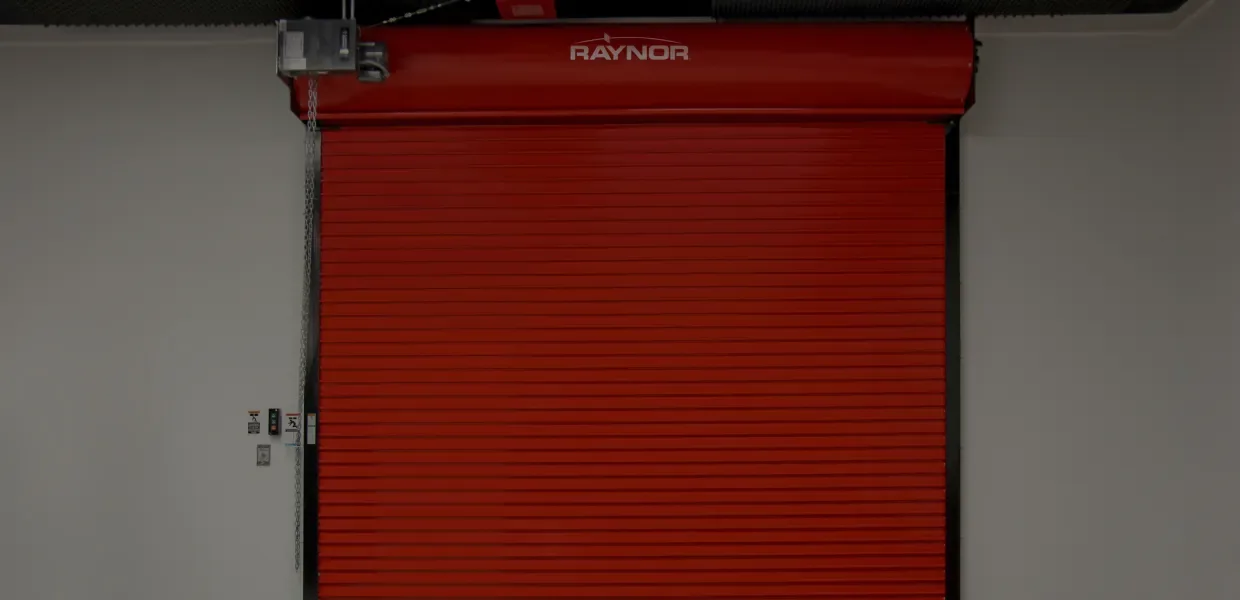 A red rolling steel door curtain seen close up