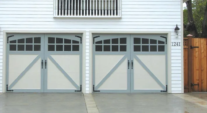 A timber slat garage door with narrow glazing on a contemporary home