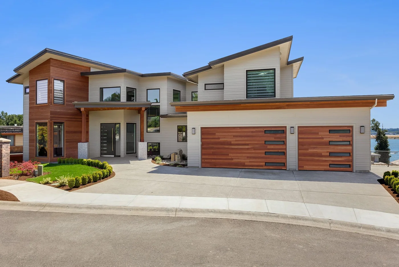 A contemporary two bay garage in warm wood grain