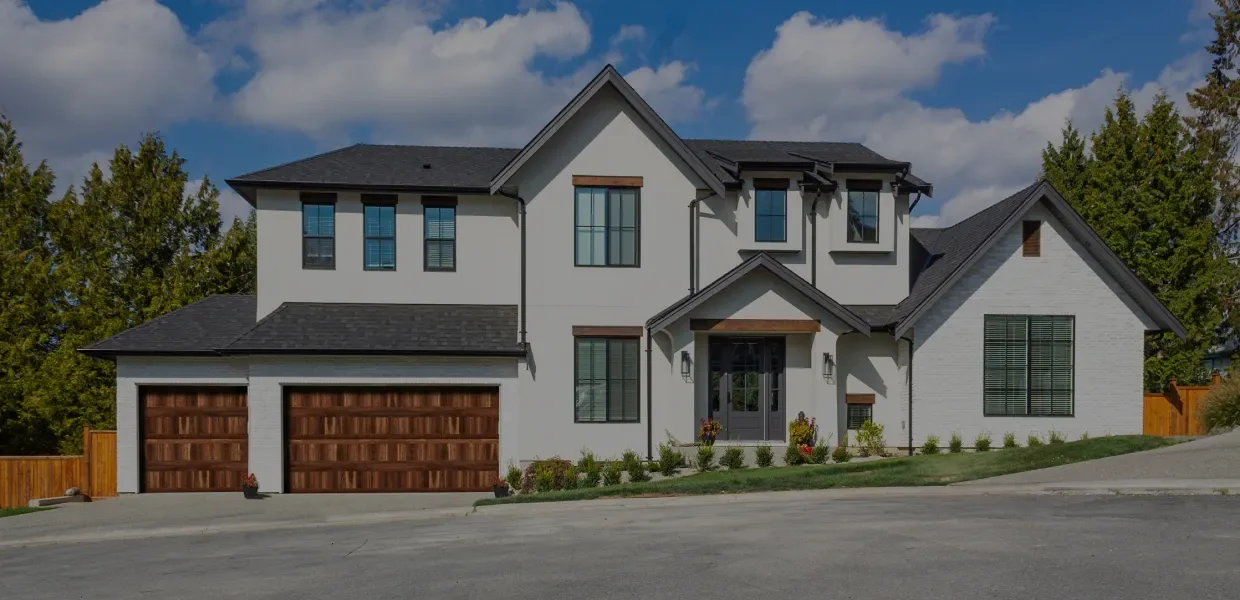 A Raynor Aspen AP200 door on a two-bay residential garage