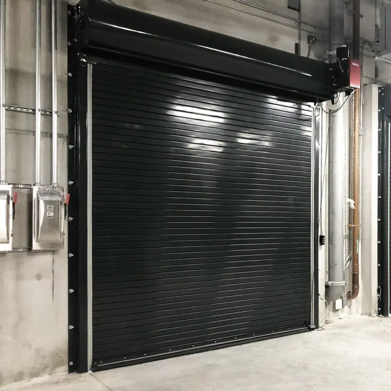 Black solid steel rolling door on a storefront