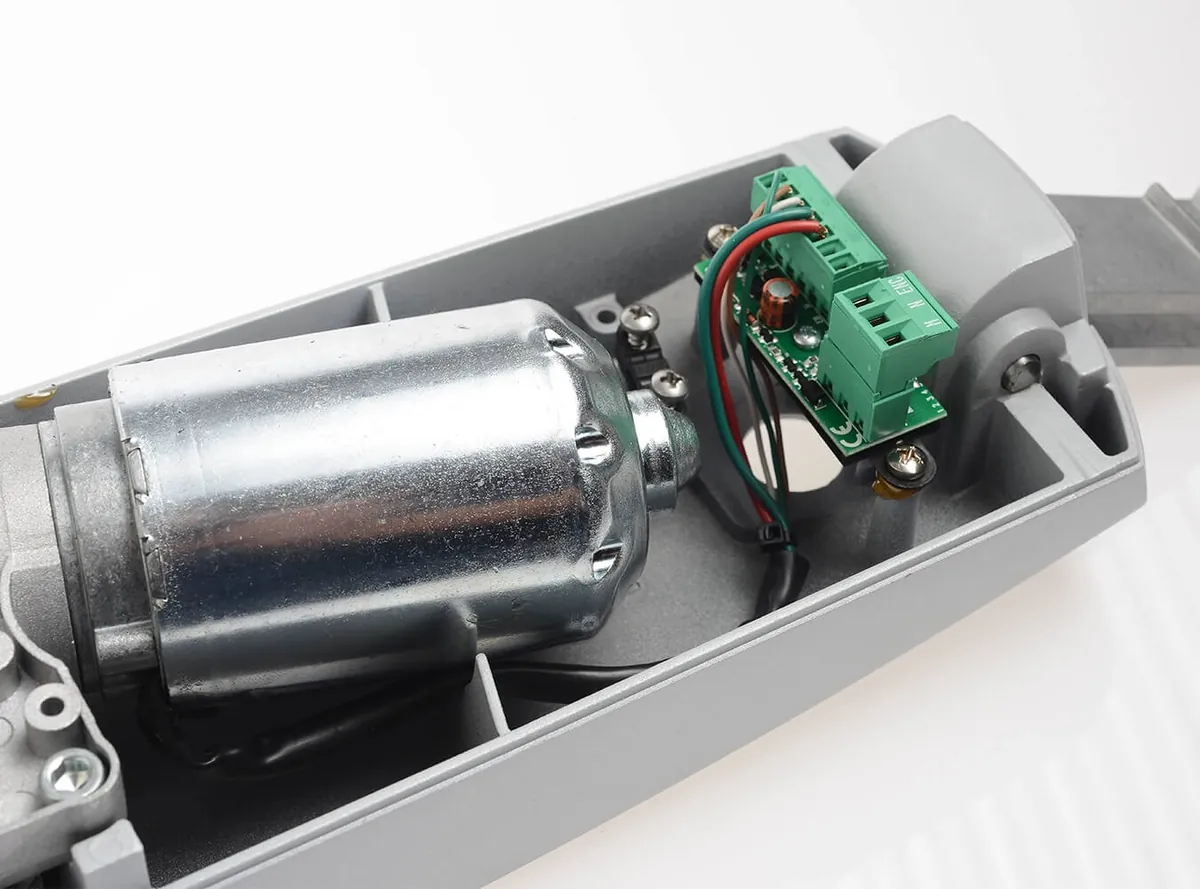CAME AXI with the housing open, showing the motor and board connections