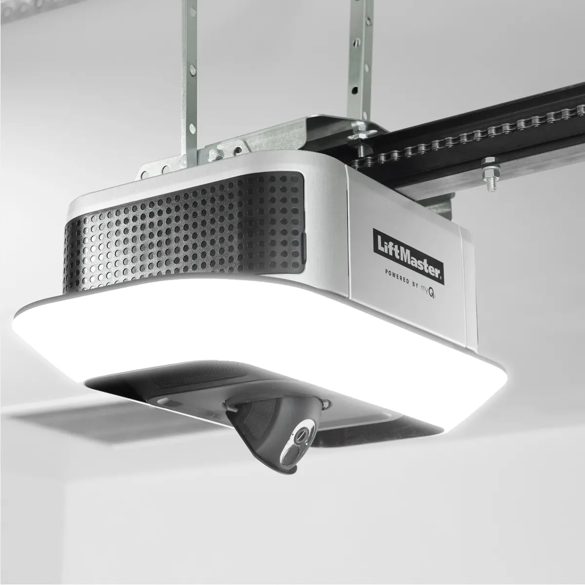 LiftMaster 4690L chain drive opener installed on a garage ceiling with its light ring glowing