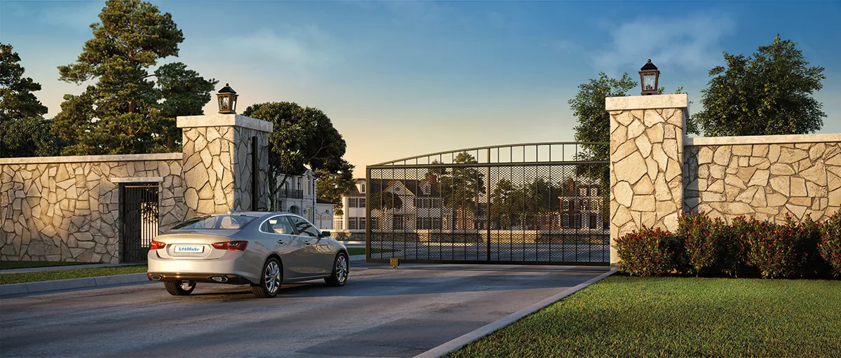 A slide gate between stone pillars at a community entrance, LiftMaster HDSL24UL render