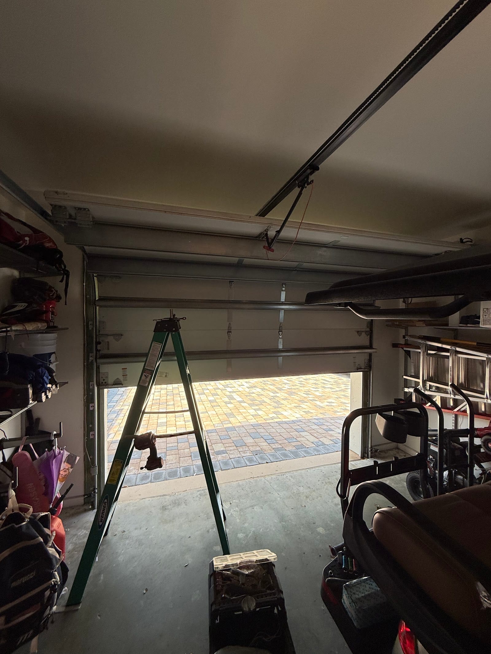 Broken garage door spring before repair